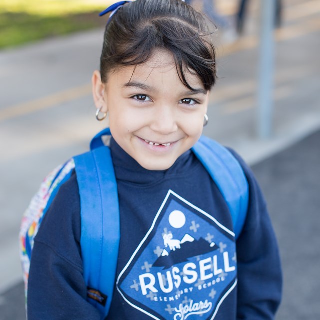 Our students are proud to show off their school spirit with their Russell shirts.