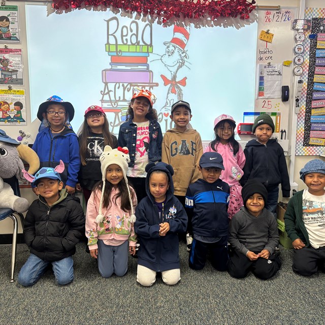 Scholars explore different worlds through reading.