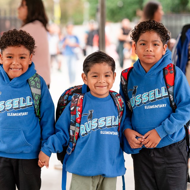 Our students are proud to show off their school spirit with their Russell shirts.