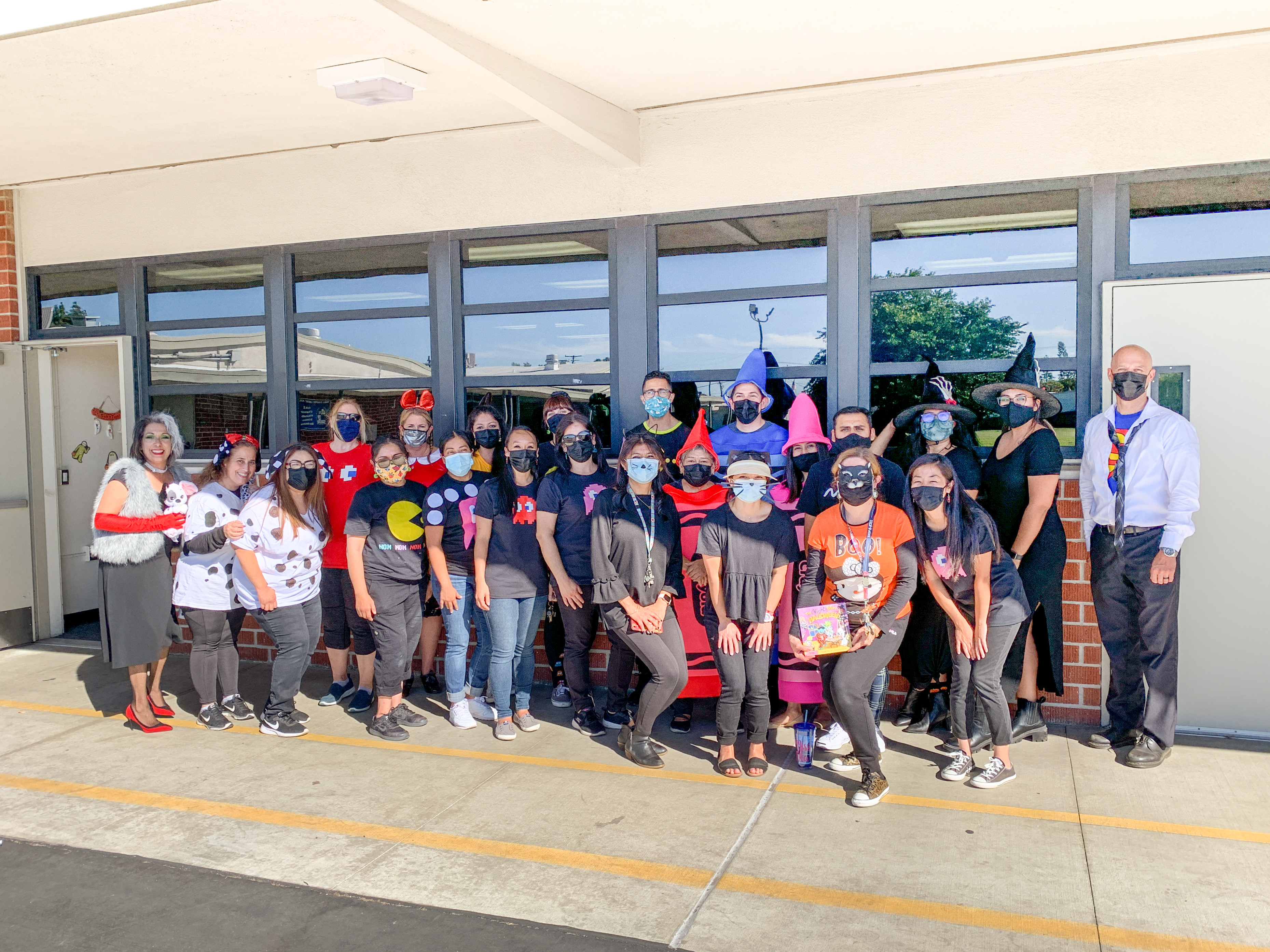 Russell staff are all smiles (underneath their masks) for Halloween!