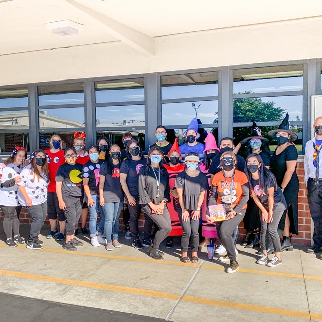 Russell staff are all smiles (underneath their masks) for Halloween!